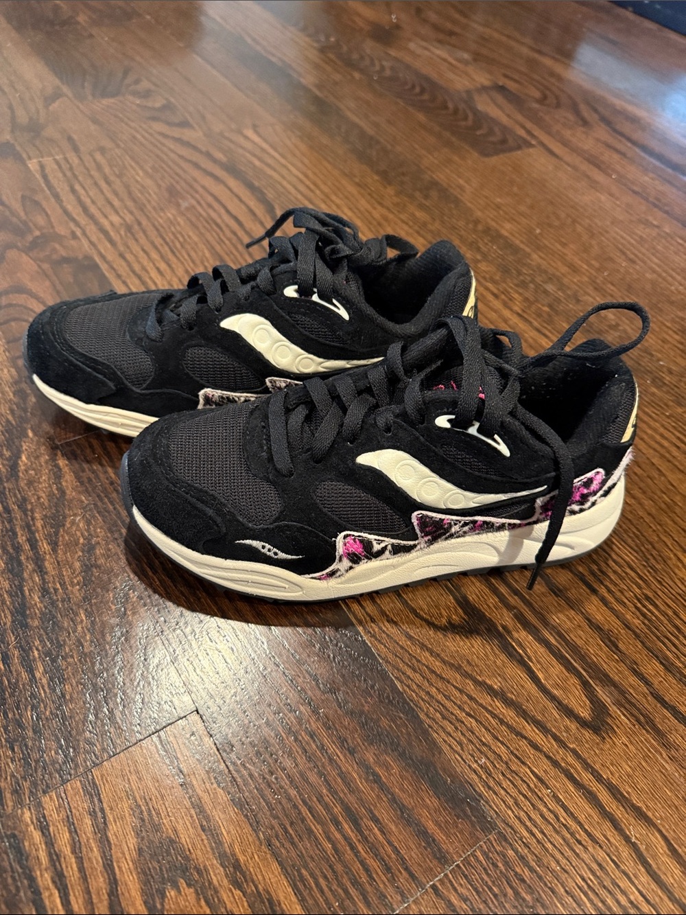 Saucony Black Sneakers with Cream Midsole and Leopard Pink Accents